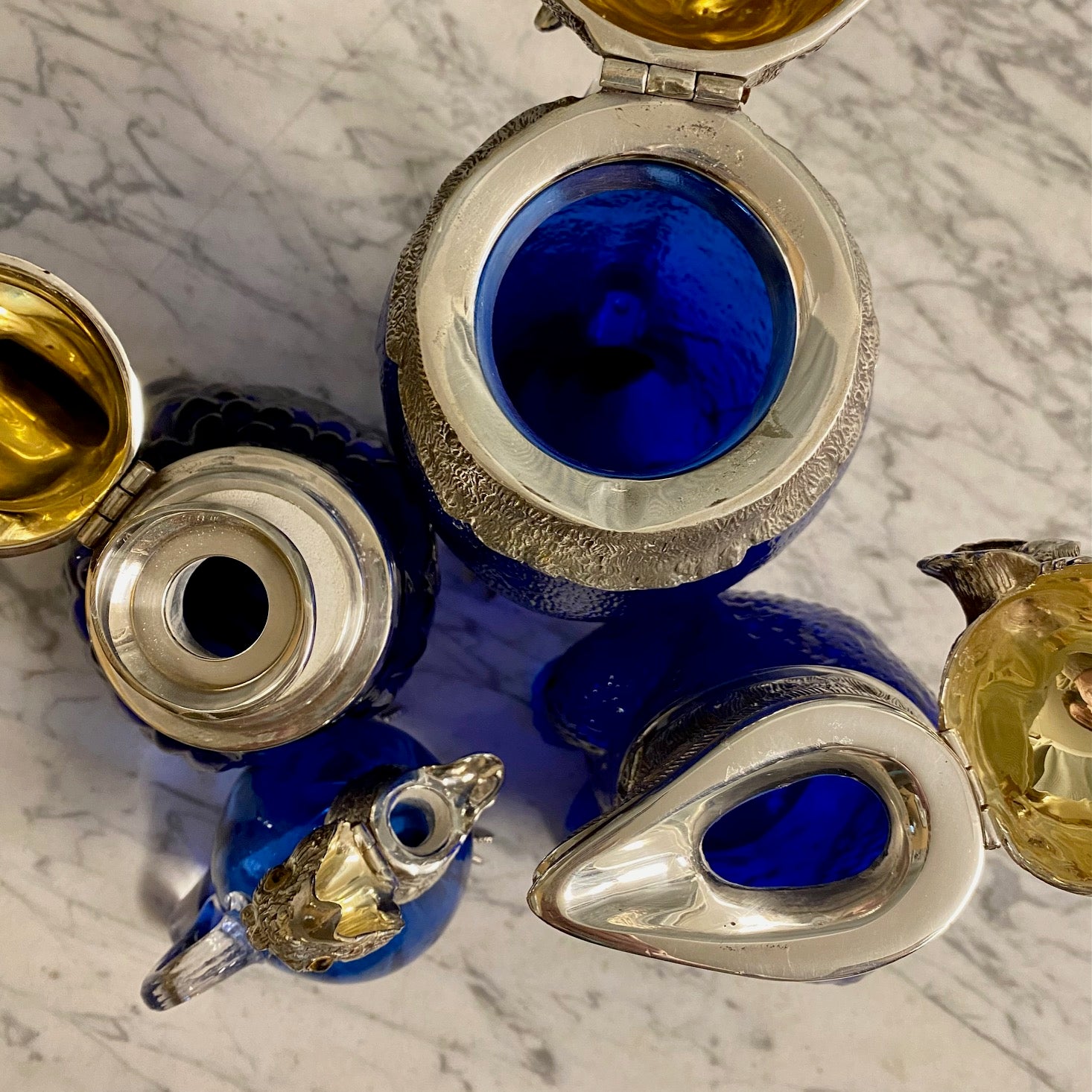 NOVELTY BLUE GLASS SILVER PLATED ANIMAL DECANTERS