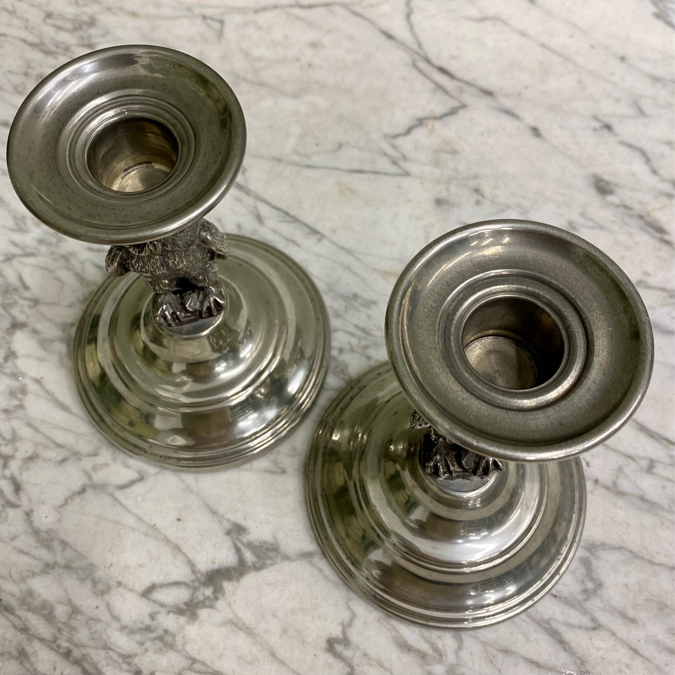 A Rare Pair of Irish Pewter, Owl Candlesticks