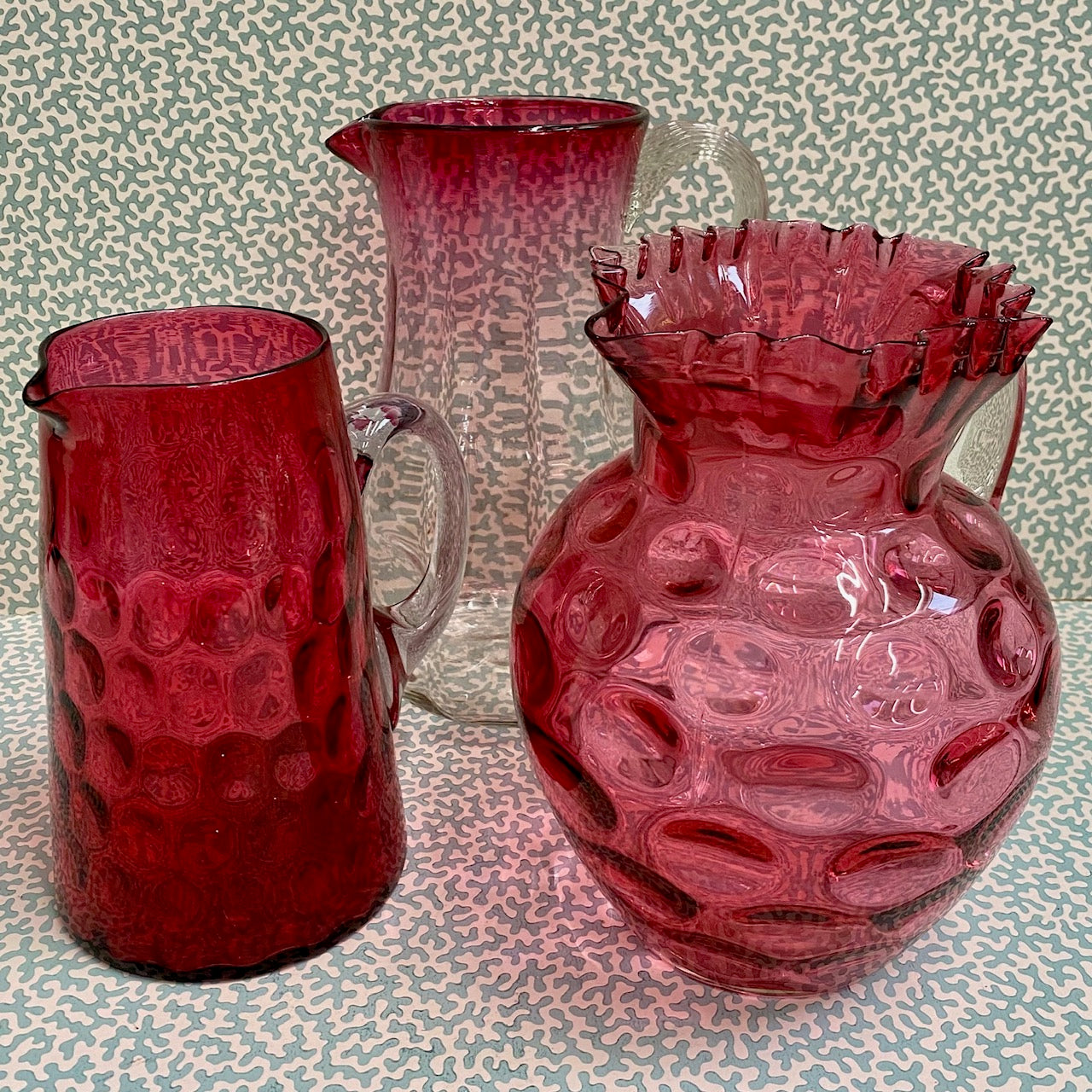 Large Cranberry Glass Jug with Dimpled Body and Frilled Top  S15