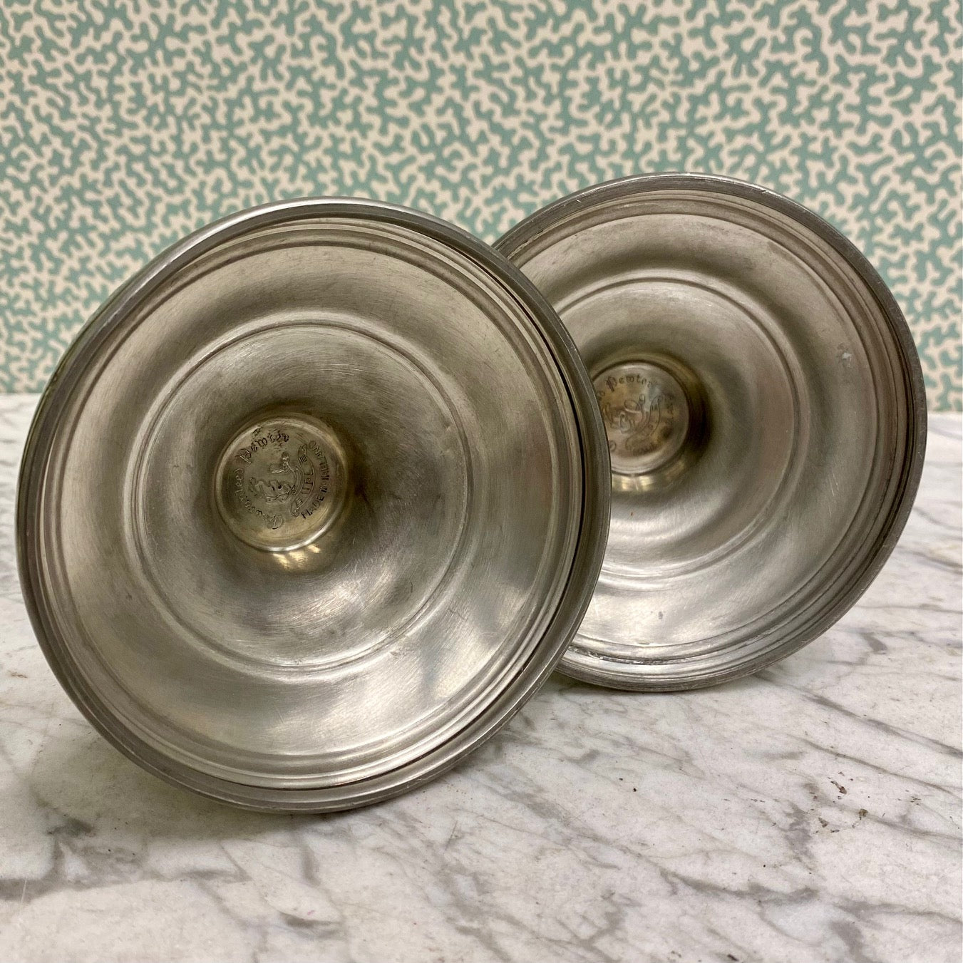 A Rare Pair of Irish Pewter, Owl Candlesticks